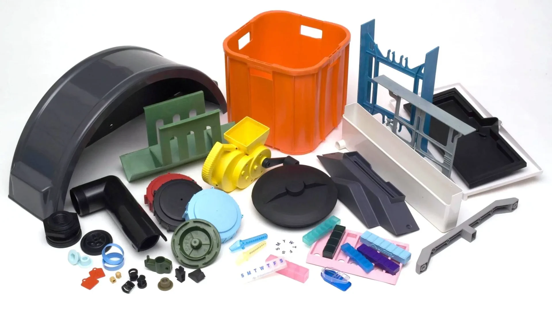 Diverse-injection-molded-plastic-parts-for-automotive-packaging-and-household-use-scaled